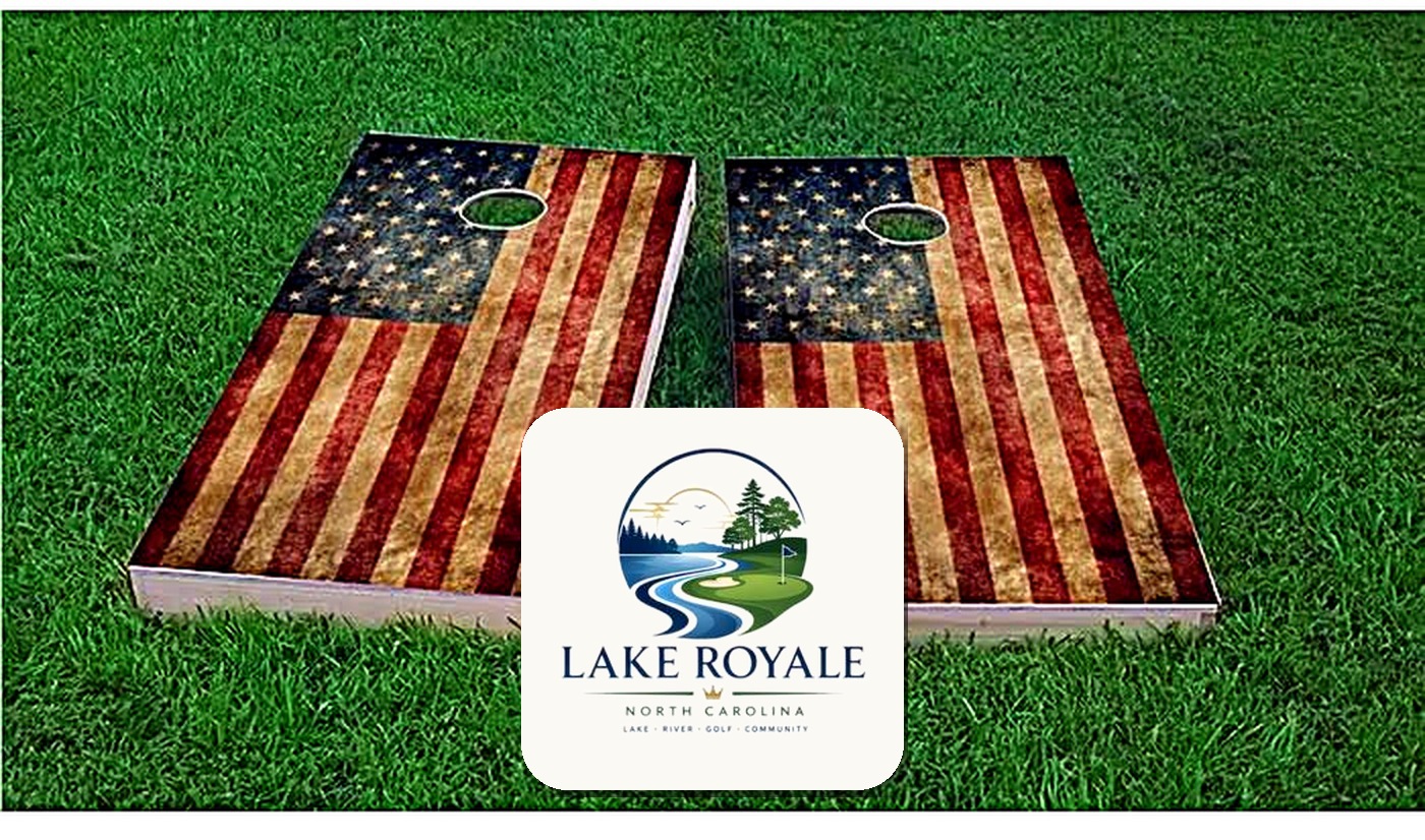 Flag-themed cornhole boards with the Lake Royale logo